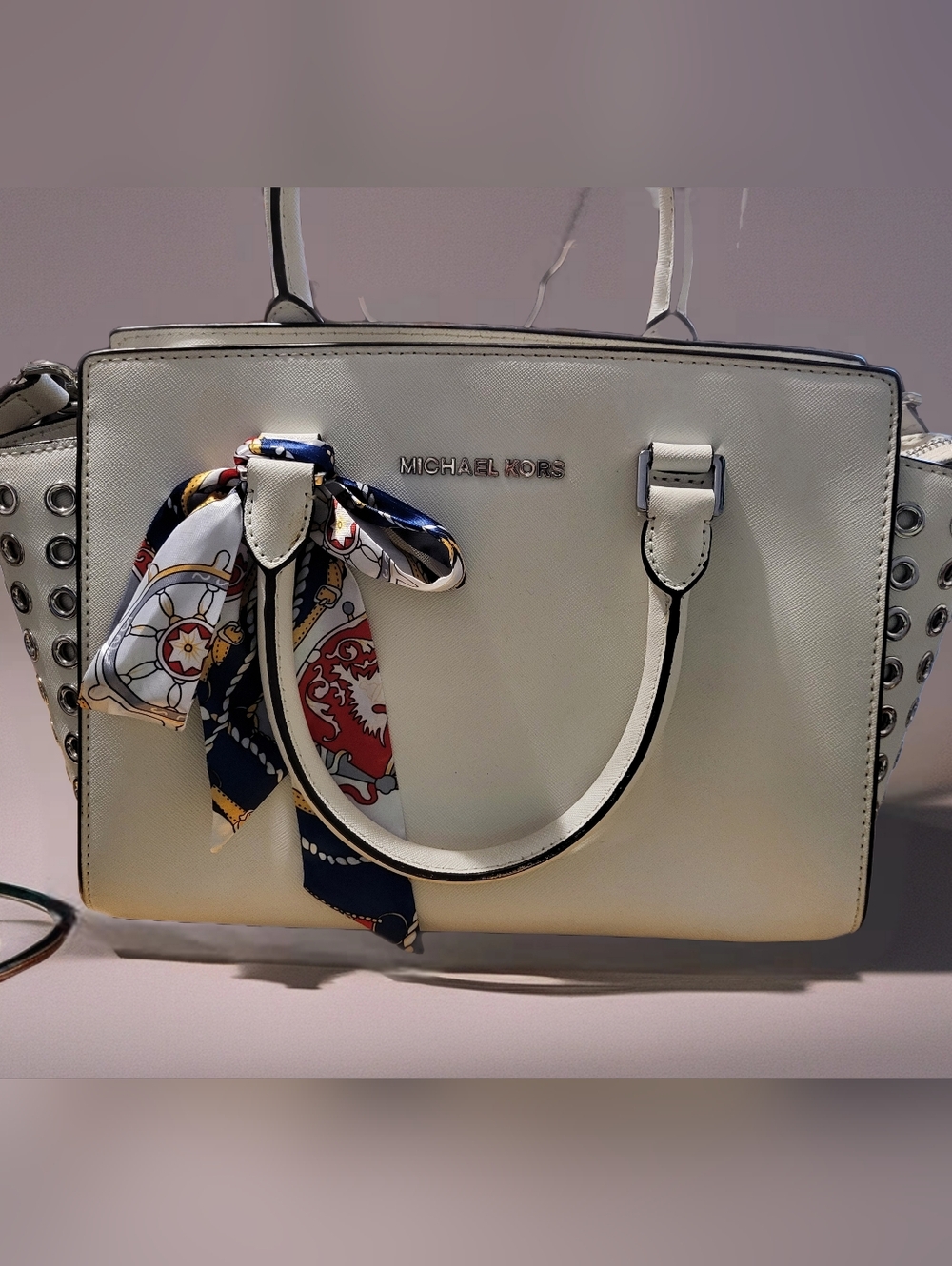 Michael Kors White Leather Satchel with Silver Metal Grommets.